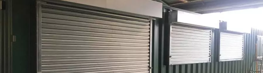 view of roller shutter doors and windows
